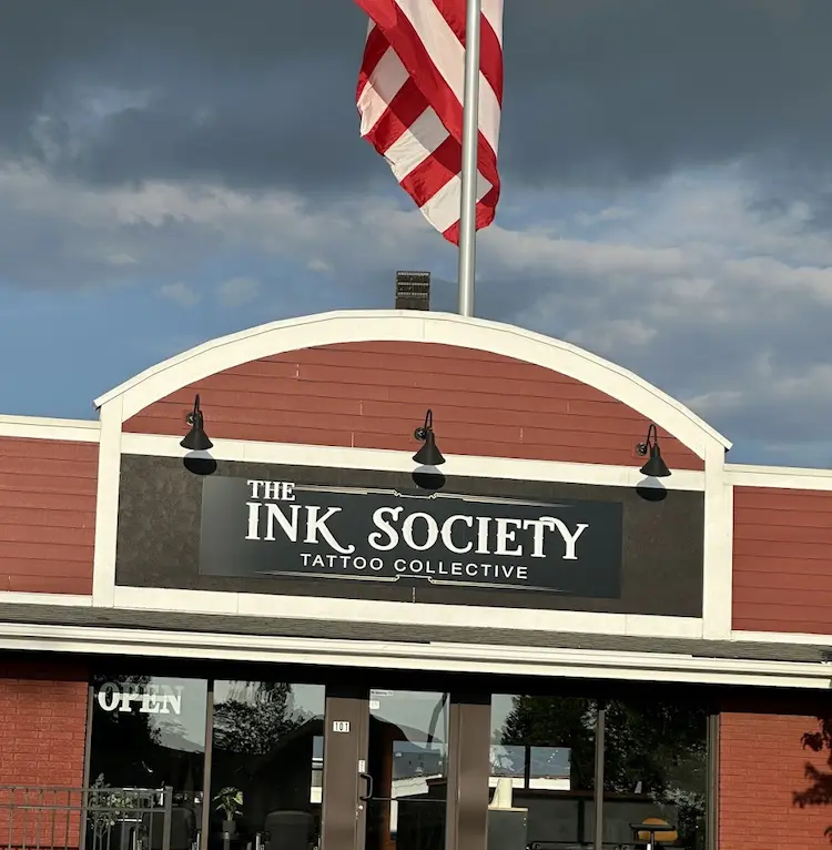 Storefront of The Ink Society, tattoo and piercing studio in Jenison, MI